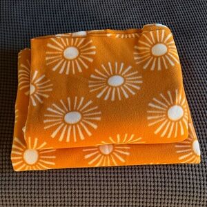 Orange Sunburst Fleece Material